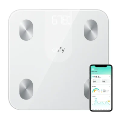 Eufy Smart Scale A1 — White scale with complete platform and electrodes; phone shown separately
