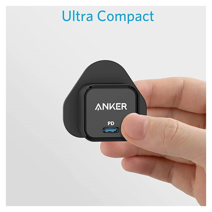 Complete Black Anker PowerPort III 20W Cube charger held in a hand with its USB-C output visible