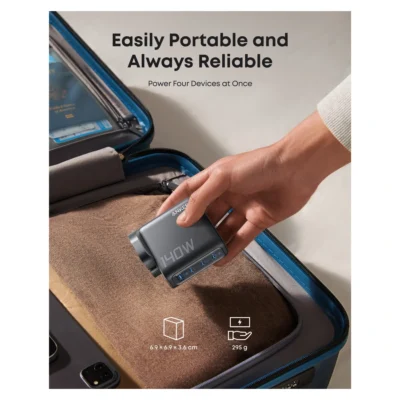 Complete Dark Gray Anker 140W charger being packed in a bag
