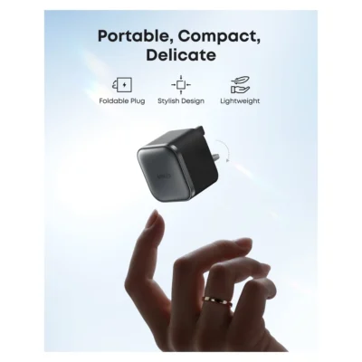 Complete Black Anker Nano 45W charger with foldable UK three-pin plug in portability feature view