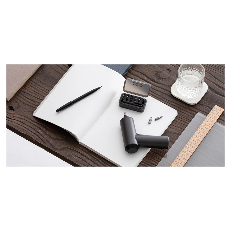 Mi Cordless Screwdriver — complete tool and accessories on a desk