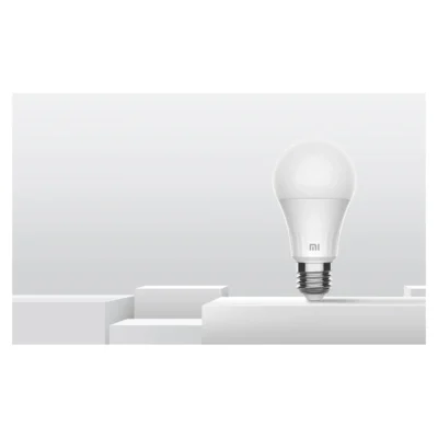 Whole Mi Smart LED Bulb Warm White displayed on a white pedestal