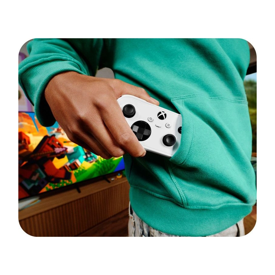Teenager pulls out the XBOX Nano Controller from their sweatshirt front pocket.