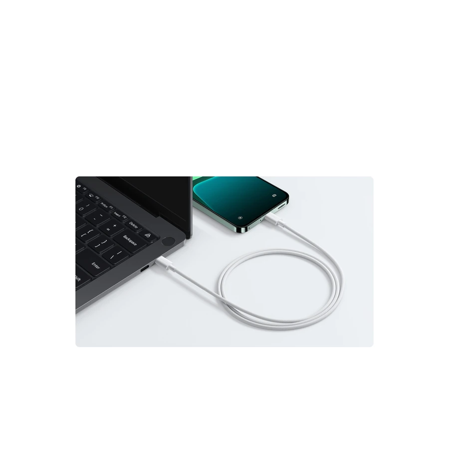 Xiaomi 3A Braided USB-C to USB-C Cable (1m) — complete White cable connecting a laptop and phone