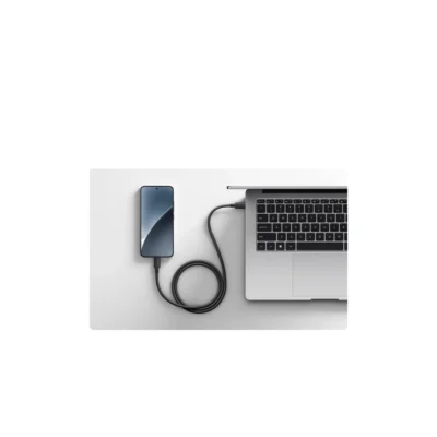 Xiaomi 6A High-speed USB4 Braided USB-C to USB-C Cable (1m) — complete coiled Dark Gray USB4 cable connecting a phone and laptop
