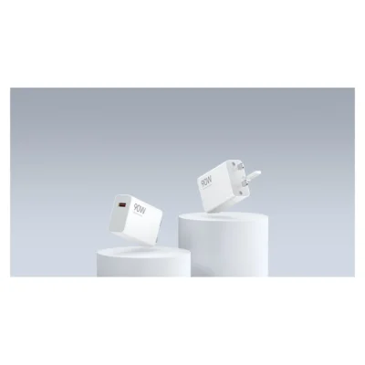 Complete White Xiaomi 90W HyperCharge UK charger front and three-pin plug views in the official Xiaomi scene