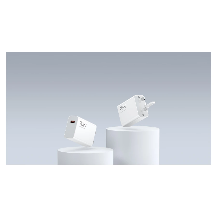 Complete White Xiaomi 90W HyperCharge UK charger front and three-pin plug views in the official Xiaomi scene
