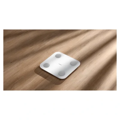 Xiaomi Body Composition Scale S400 — complete scale on a wooden floor