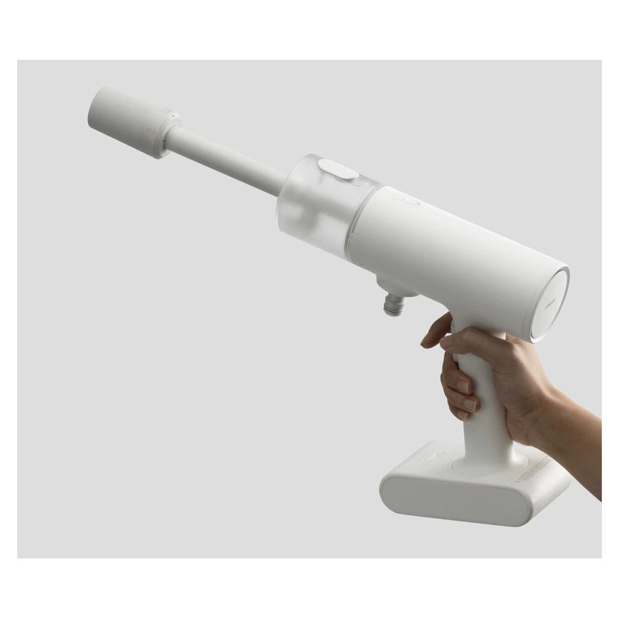 Xiaomi Cordless Pressure Washer — complete White washer held by its grip with full spray head and battery visible
