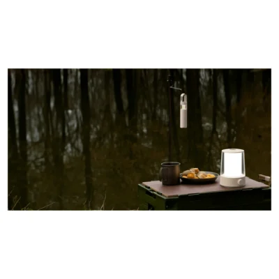 Xiaomi Multi-function Camping Lantern — whole lantern on a camping table