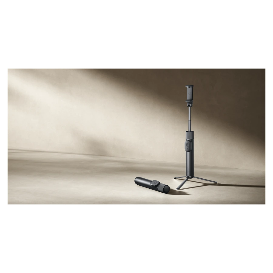 Xiaomi Selfie Stick Tripod Mini — complete extended tripod on a table