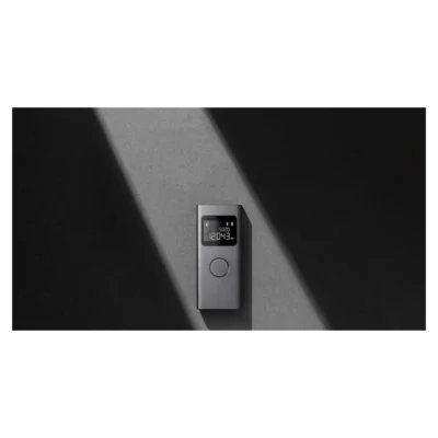 Xiaomi Smart Laser Measure — complete device against a wall