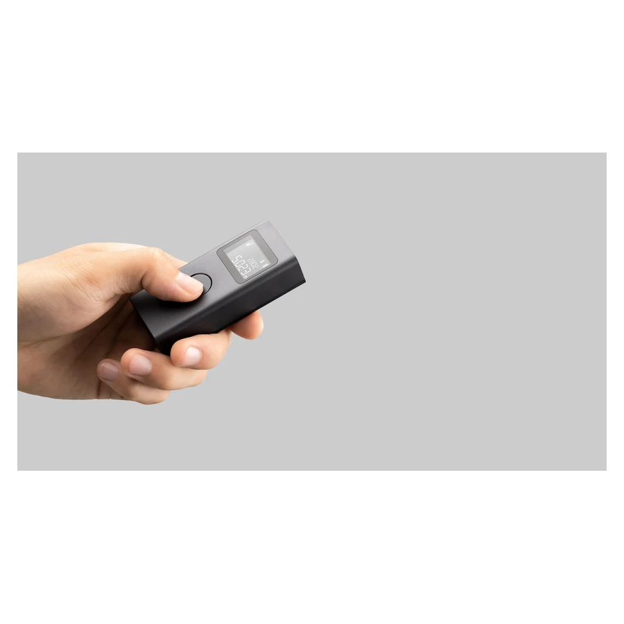 Xiaomi Smart Laser Measure — complete device held in hand