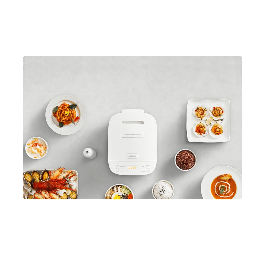 Complete Xiaomi Smart Multifunctional Rice Cooker viewed from above with prepared dishes